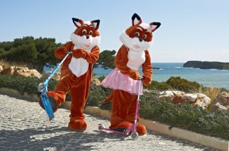 kids-club-mascots-on-micro-scooters